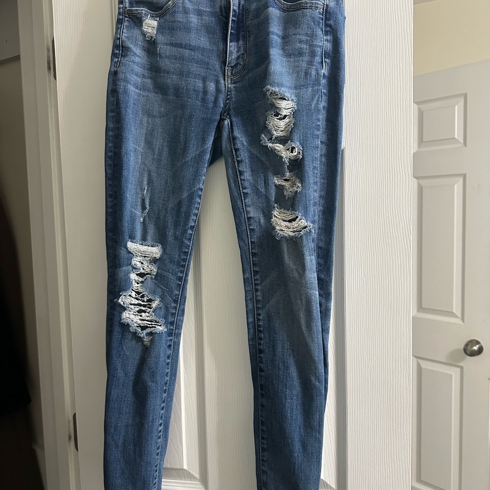 American Eagle Outfitters Blue Ripped Skinny Jeans (Super Stretch)